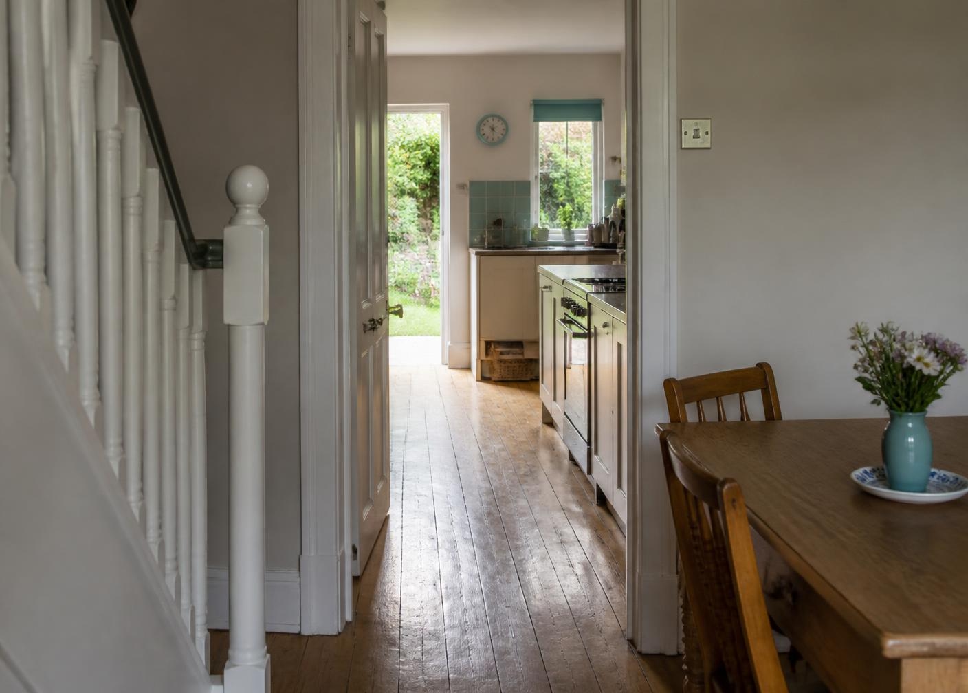 Hallway and kitchen of a well-kept British home